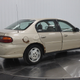 Illustration for article titled Even Rusty Beater Geo Prizms Deserve Nice Photo Shoots At The Dealership